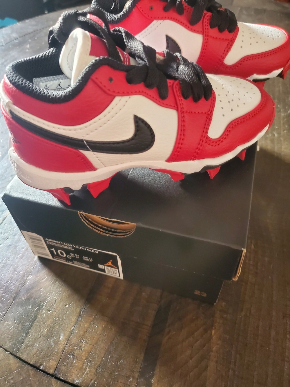 Nike Kids Red/White Low-Top Cleat with Black Swoosh